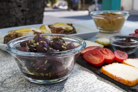 Table with different plates. Tasty different cheese, italian bruschetta with  Foto stock