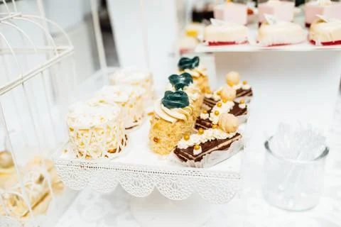 Table with different sweets for party. Candy bar. Stock Photos