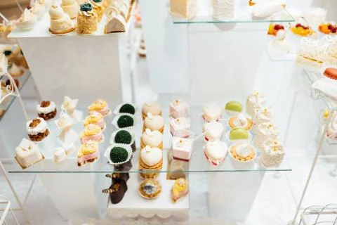 Table with different sweets for party. Candy bar. Stock Photos
