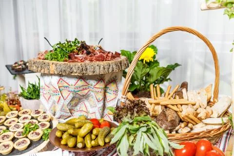 Table with different type of snacks preparing for party. Stock Photos