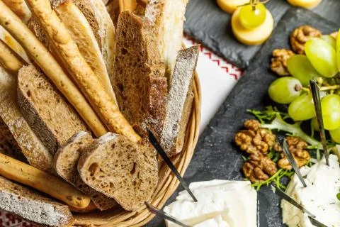 Table with different type of snacks preparing for party. Foto stock