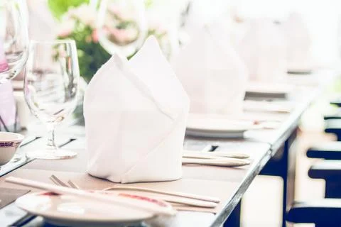 Table dining set in the hotel restaurant - light vintage filter effect proces Stock Photos