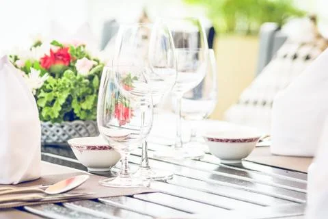 Table dining set in the hotel restaurant - light vintage filter effect proces Stock Photos
