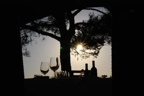 Table to dinner in the sunset evening Stock Photos