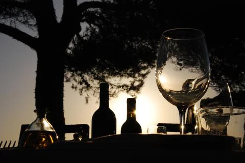 Table to dinner in the sunset evening Stock Photos