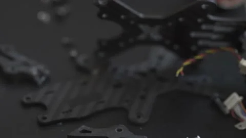 On the table a disassembled FPV drone after a fall Video stock 149774171