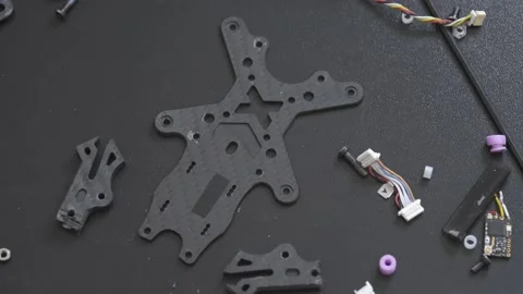 On the table a disassembled FPV drone after a fall Video stock 149774179