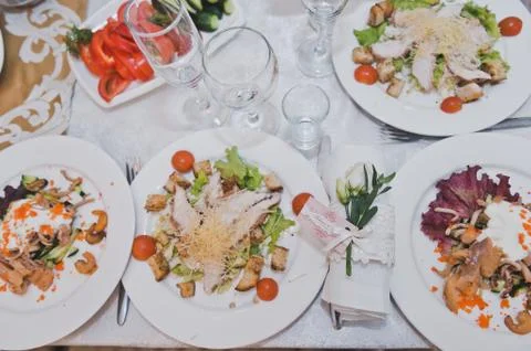 Table with dishes of cold appetizers waiting for the arrival of guests 419. Stock Photos