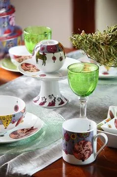 Table with dishes Stock Photos