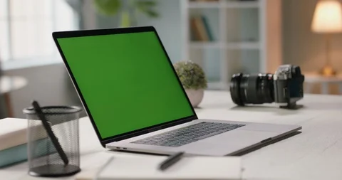 The table of distant worker at home. Modern laptop computer with chroma key Stock-Footage 127655642