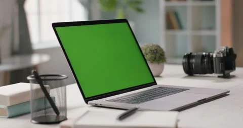 The table of distant worker at home. Modern laptop computer with chroma key Stock Footage 133126262