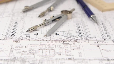 On the table is a drawing for builders and stationery. Close up Vidéo 73672182