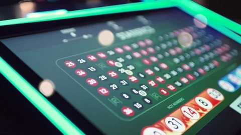 Table with electronic roulette numbers in the casino Video stock 125769393