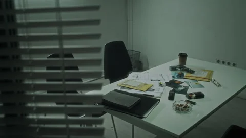 Table with Evidence in Interrogation Room at Bureau of Investigation Stock Footage 276715699