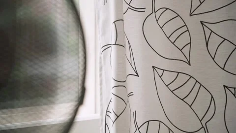 Table fan blowing kitchen curtains Stock Footage 344692019