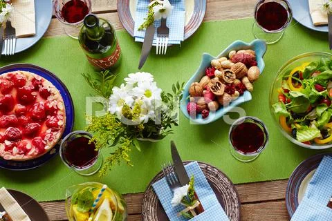 Table with festive food prepared for holiday celebration Stock Photos