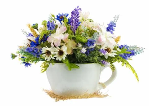 Table floral arrangement made of artificial flowers. Stock Photos