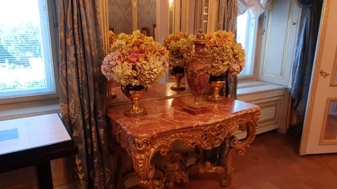 Table with flower pots inside the museum room Stock Footage 138981692