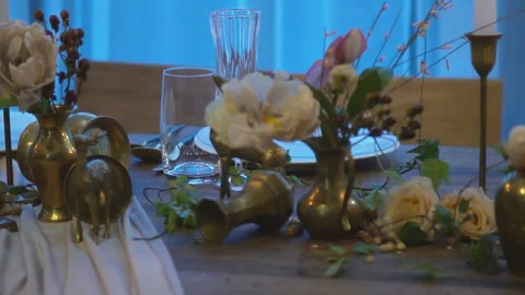 Table with flowers and light candles Stock Footage 132994886