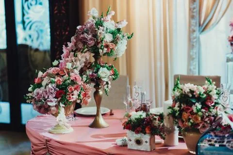Table with flowers	 Stock Photos