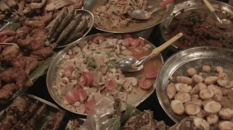 A table of foods at the Chiang Mai gate night market in Chiang Mai Thailand. Stock Footage 48209904