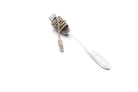 Table fork and spaghetti wires Stock Photos