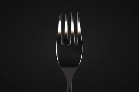 Table fork close up. Dark background. Design element. Stock-Fotos