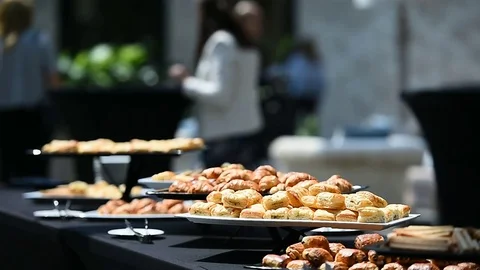 Table full with fresh pastry products during event Stock Footage 77827854