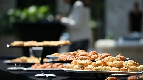 Table full with fresh pastry products during event 動画素材 77827856