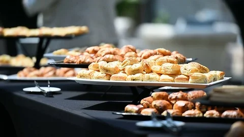 Table full with fresh pastry products during event Vídeo Stock 77827865