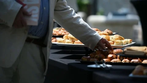 Table full with fresh pastry products during event Stock Footage 77827879