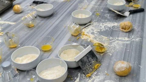 Table full of messy ingredients while baking. Stock Photos