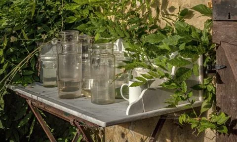Table with glasses Stock Photos