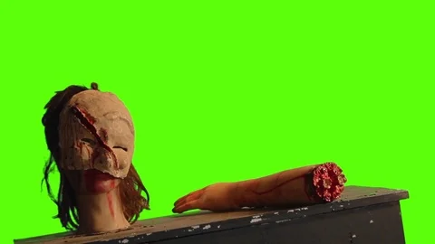 Table of horror on a green screen Stock Footage 75150092