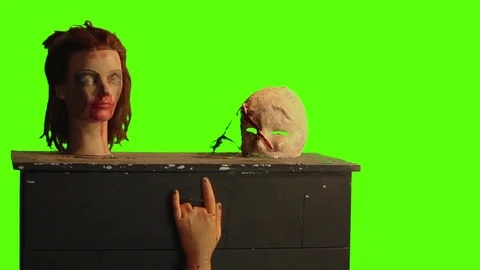 Table of horror on a green screen Stock Footage 75167760