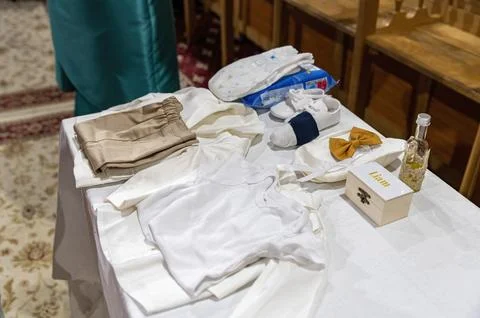 A table with items for an Orthodox baptism Foto stock