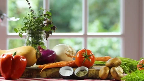 Table in the kitchen with many kinds of vegetables Stock Footage 91045412