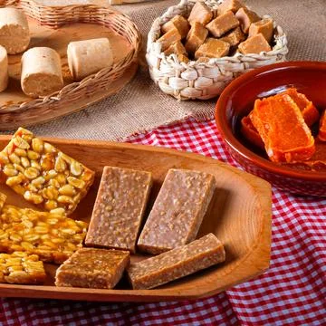A table laden with various typical Brazilian sweets and desserts Stock Photos