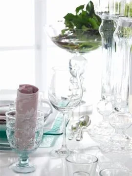 A table laid with glasses Stock Photos