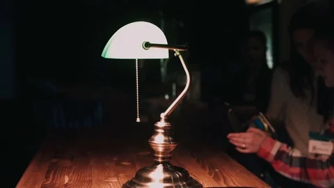 Table lamp in a cafe close-up Stock Footage 76583818