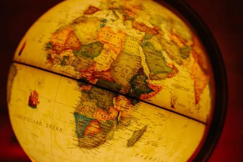 A table lamp in the form of a globe, a rotating globe of the earth. Georgafia of Stock Photos