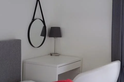 Table lamp reflected in the mirror Stock Photos
