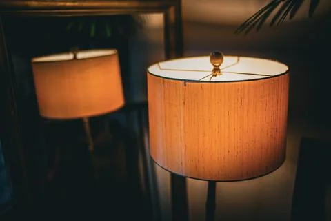 Table lamp reflected in a mirror Stock Photos