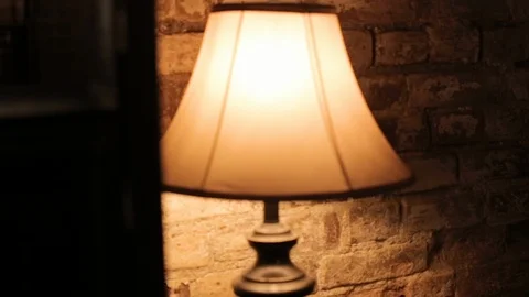  table lamp stands on the table (colour) 스톡 동영상 122446597