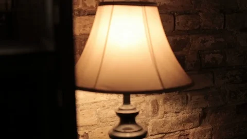  table lamp stands on the table Stock Footage 122446604