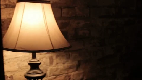  table lamp stands on the table Stock Footage 122446618