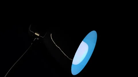 Table lamp studio video LED light changing color filters red, blue, green, orang Stock Footage 130055554