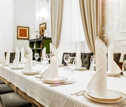 A table with leather chairs at restaurant Stock Photos
