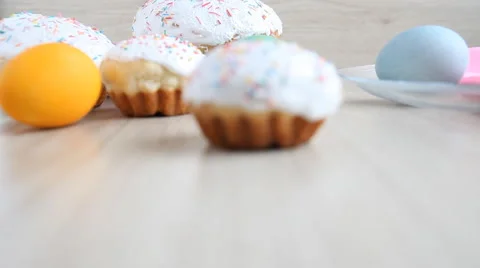 On the table lie the Easter cakes and colored eggs. Stock Footage 61569678