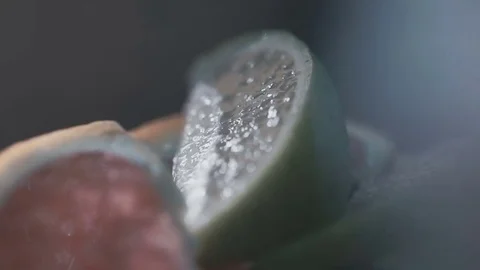 On the table lie lime and grapefruit Stock-Footage 77345562